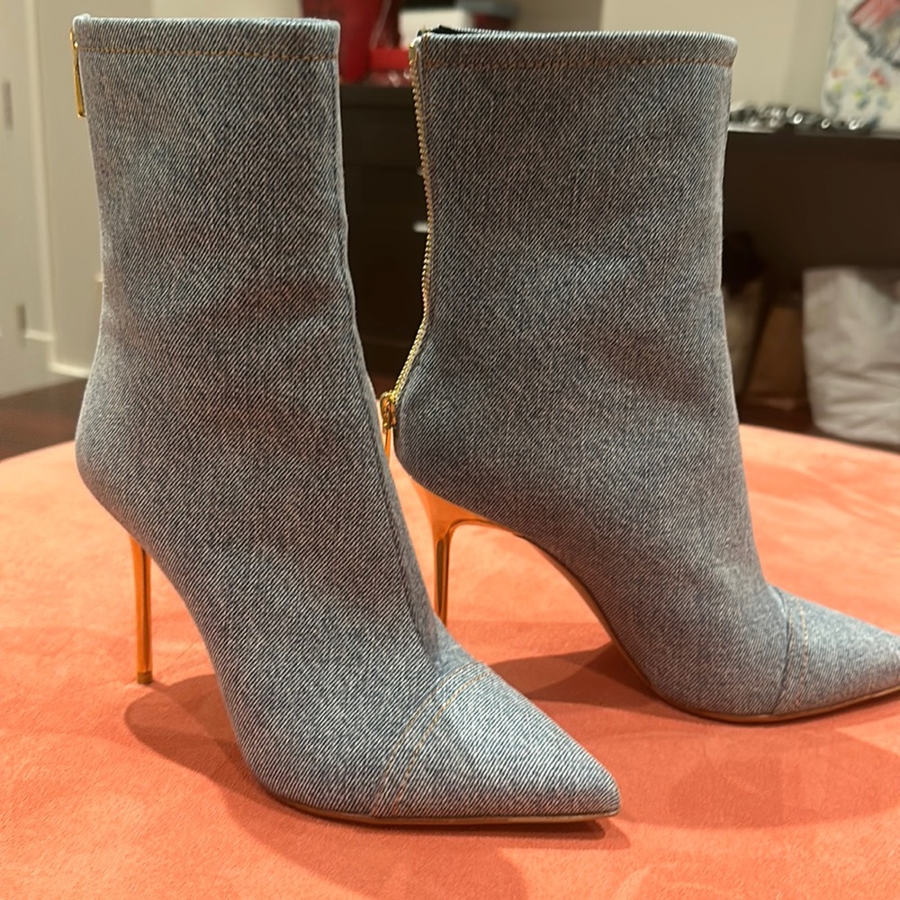 Selling brand new Balmain high heeled denim bootees with gold heel in size 36.5
